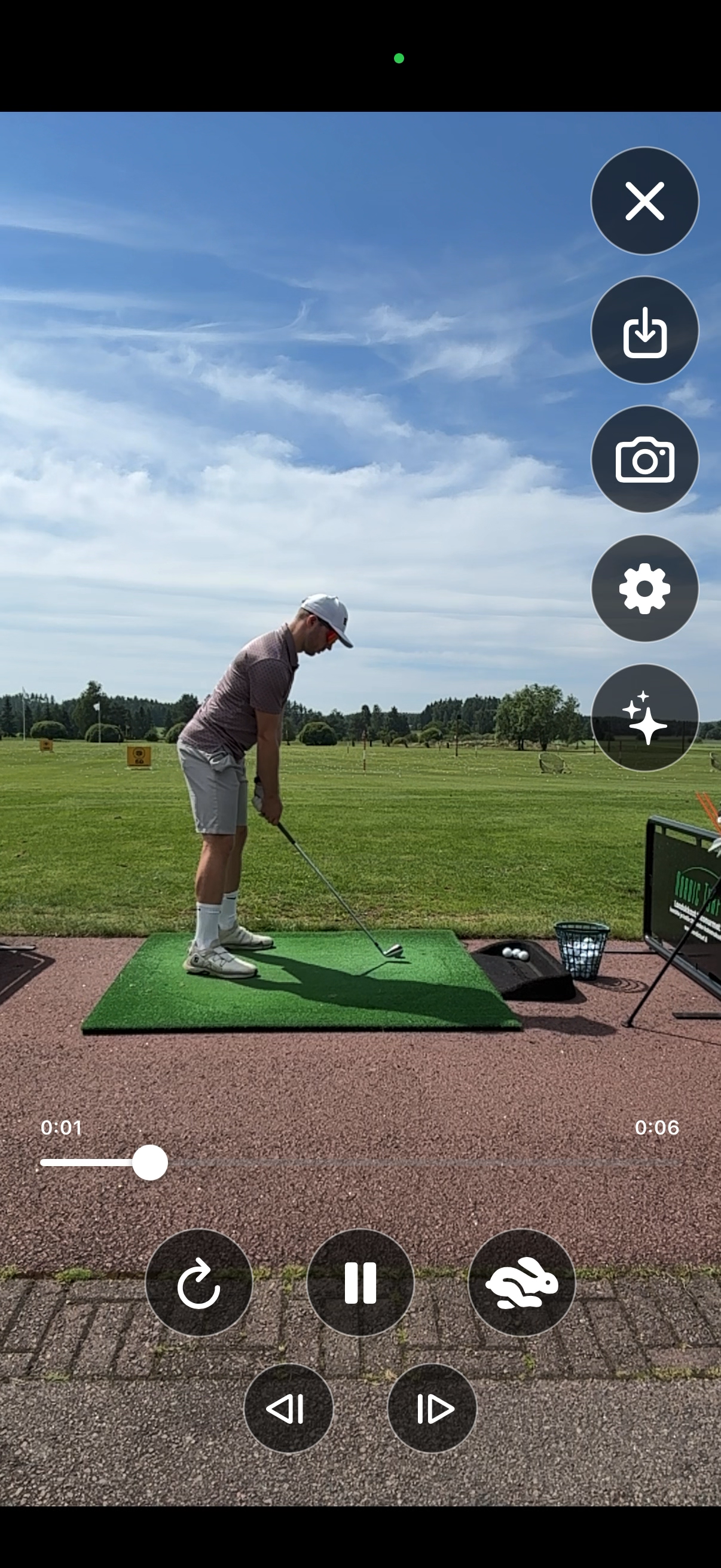 Reviewing a recorded iron swing in slow motion