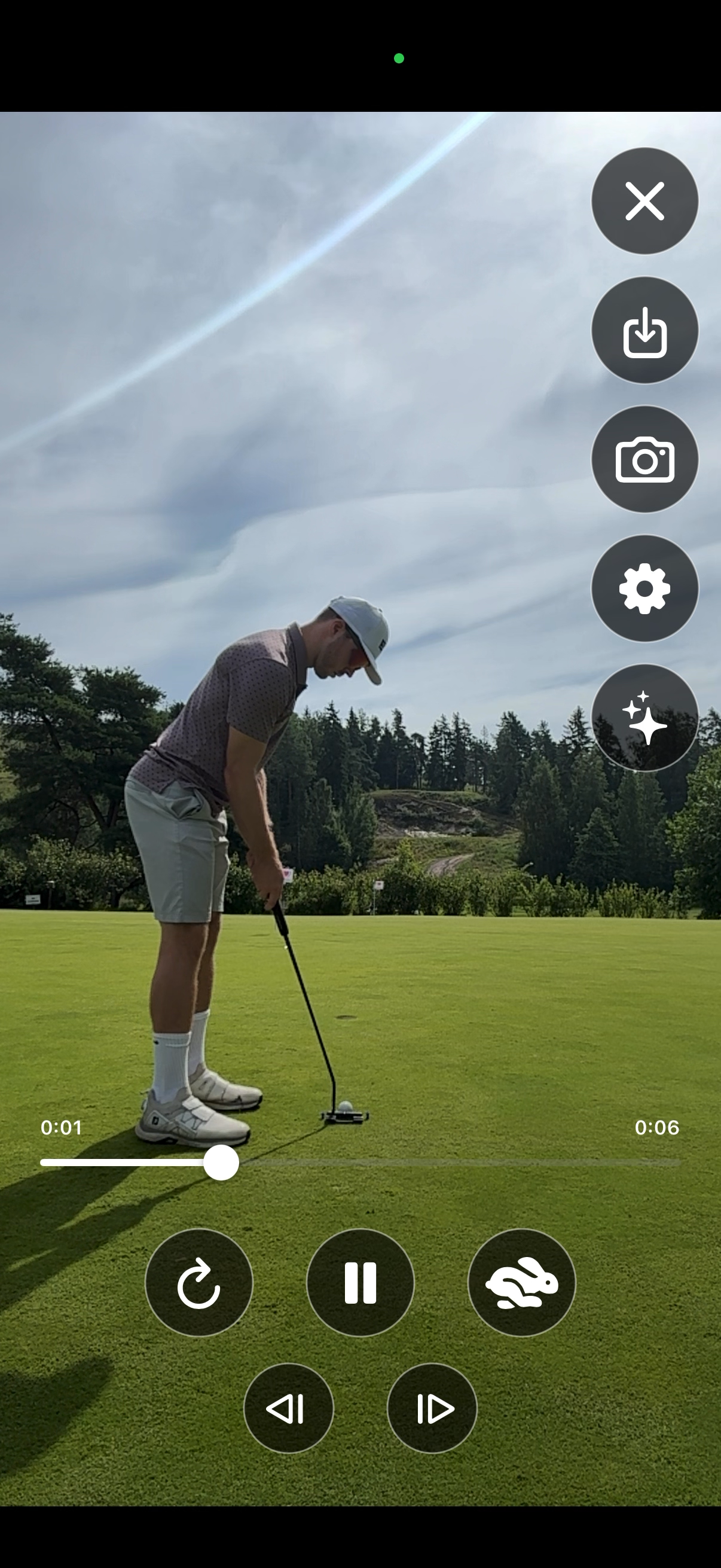 Reviewing a recorded putt in slow motion